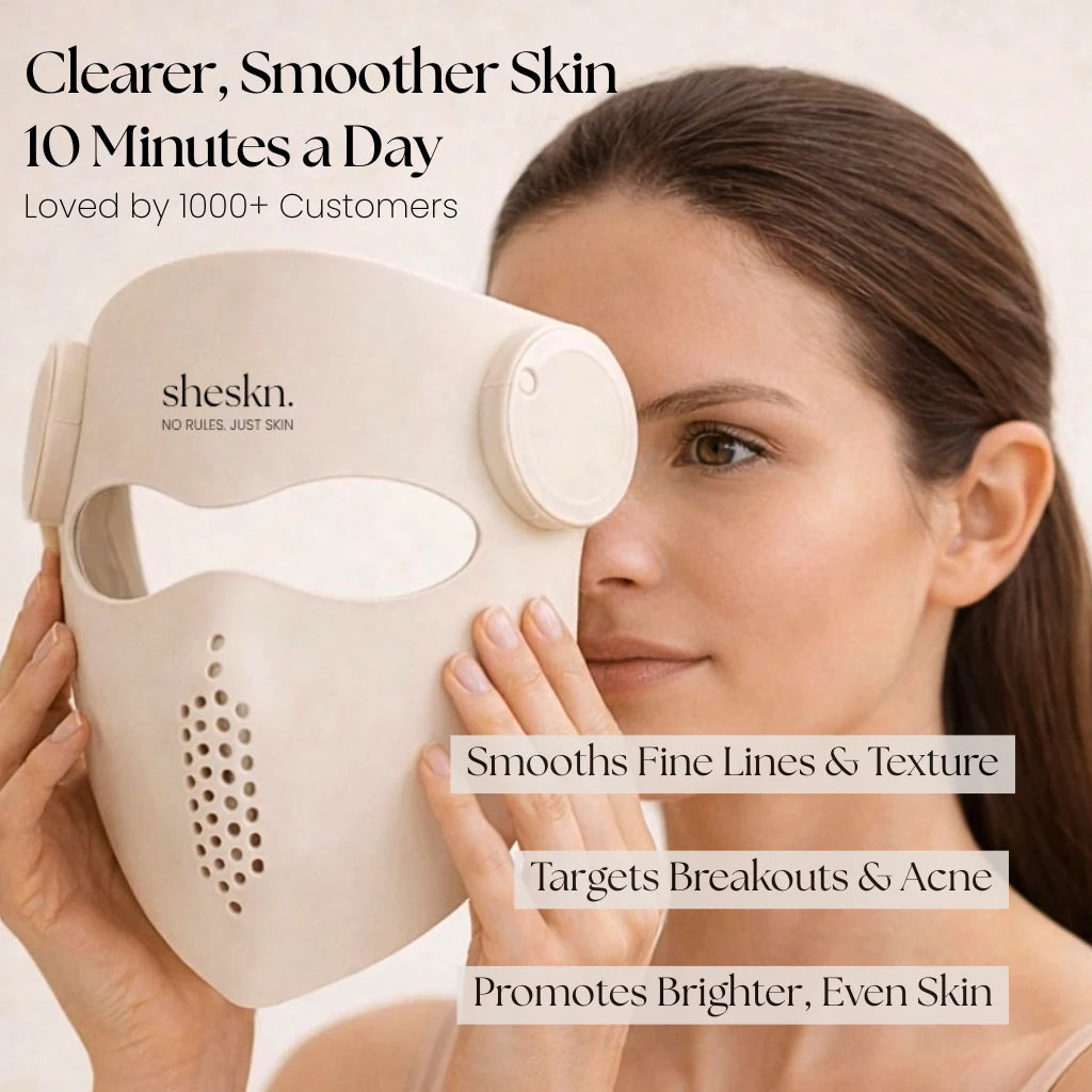 Woman holding Luméskn LED face mask for at-home light therapy