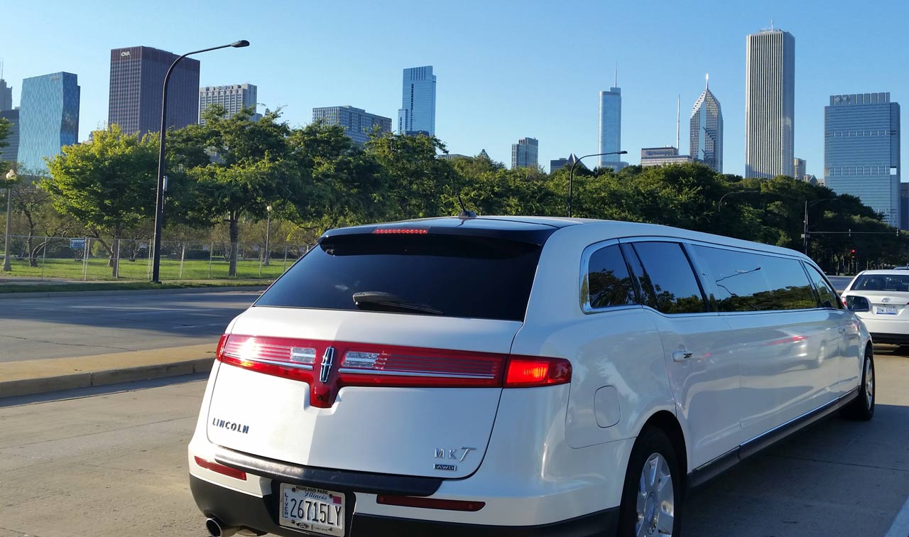 Chicago downtown with a white stretch limousine