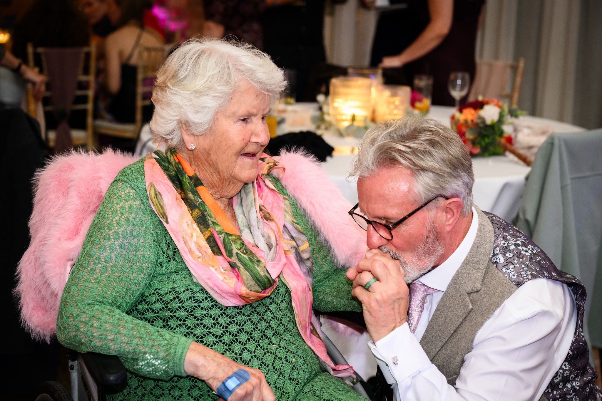 Father of the bride sharing a special moment with his mother in law captured by West Sussex Wedding Photographer Paul Streeter-Staniford